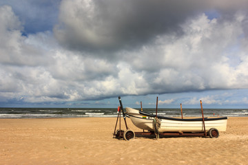 Fototapeta premium Boat on the beach of baltic sea.