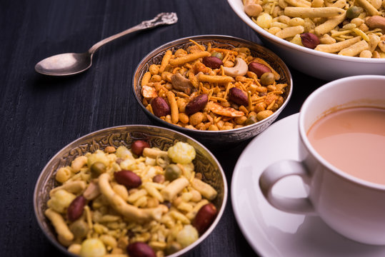indian famous snack called Farsan or chivada or chakna with hot tea