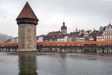 Fototapeta premium Chapel Bridge over Reuss River, Lucerne, Switzerland