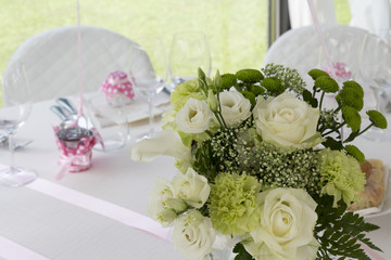 Restaurant with tables set for a wedding reception