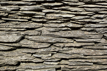 pattern of decorative slate stone wall side view surface