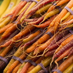 Stack of carrots for sale at a market stall, Pike Place Market,