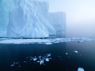 Big icebergs are ont he arctic ocean in Greenland