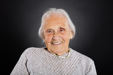 Portrait Of A Smiling Old Woman