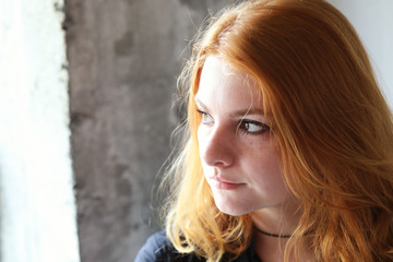 Red Haired Woman in Black Top