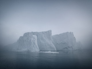 Obraz na płótnie Canvas Icebergs on arctic ocean at Greenland. May 16, 2016.