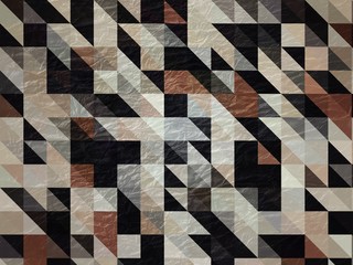 Brown triangle mosaic abstract background 