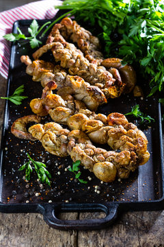 Roasted chunchules. Typical Latin American Chilean and argentine food.