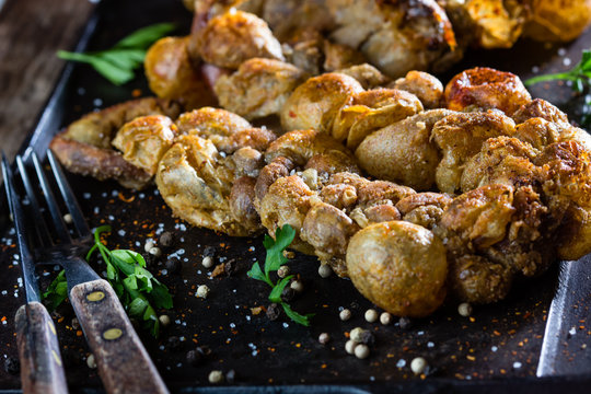 Roasted chunchules. Typical Latin American Chilean and argentina food.
