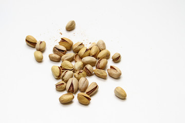  Pistachio in white background / Wonderfully delicious pistachio nuts have long been revered as the symbol of wellness and robust health since ancient times