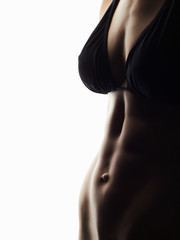 Naklejka premium body parts of girl in bikini.Woman sport body strong and beautiful.diet