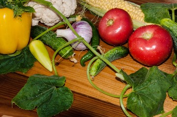 Ripe vegetables on a wooden countertop