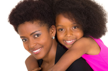 Black mother daughter posing happily
