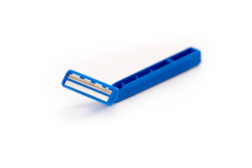 Blue shaving razor on a white background