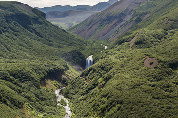 River and waterfall in the Caldera volcano Ksudach. South Kamchatka Nature Park.