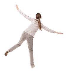 Balancing young woman.  or dodge falling woman. Rear view people collection.  backside view of person.  Isolated over white background. A girl in a gray jacket teetering on foot.