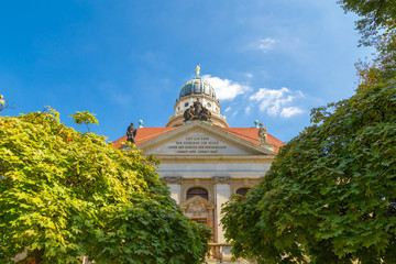 Obraz premium French Cathedral between trees.