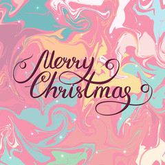 Merry Christmas lettering on abstract marble texture background
