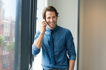 Businessman talking over phone