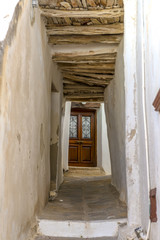 Traditional narrow street in Chora town, Naxos Island, Cyclades,