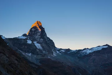 Crédence de cuisine en verre imprimé Cervin Sunset light over the elegant Matterhorn or Cervino summit (4478 m), italian side, Valle d'Aosta.