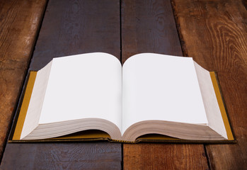 Open Bible on wooden boards