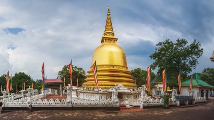 Naklejka premium A Dagoda (Stupa) at Golden Temple of Dambulla, Sri Lanka