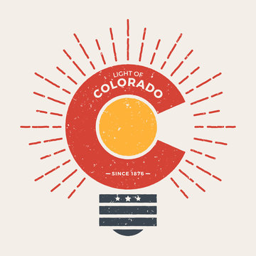 Colorado t-shirt graphic design with styled light bulb. Tee shirt print, typography, label, badge, emblem. Vector illustration.
