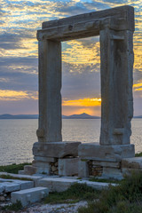Fototapeta premium Amazing sunset in Naxos, Cyclades, Greece. The incredible gate (
