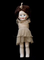 Fototapeta premium Close Up and Isolated Vintage Antique Old Doll