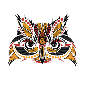 Patterned colored head of the owl. African / indian / totem / tattoo design. It may be used for design of a t-shirt, bag, postcard and poster.