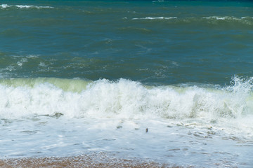 beautiful beach and small waves in the sea