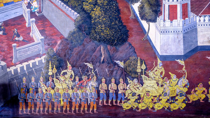 Masterpiece of traditional Thai style painting art old (1931) of Ramayana story on the temple wall of famous Wat Phra Kaew in Bangkok, Thailand..Photo taken on: Oct 6th, 2016
