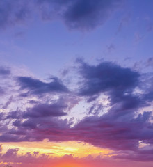 Beautiful sunset through the evening cloudy sky/Beautiful sunset through the evening cloudy sky