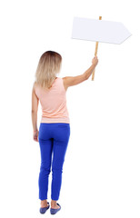 Back view woman showing sign board. man holds information plate. Rear view people collection. backside view of person. Isolated over white background. The blonde in a pink t-shirt holding a pointer.
