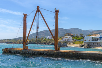 Heavy nautical equipment on a dock.