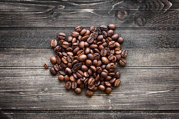 coffee beans on wooden background