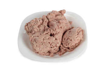 Minced meat on the plate on a white background