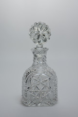 crystal decanter on a gray background