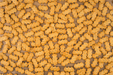 Crackers with poppy seeds old wooden table.