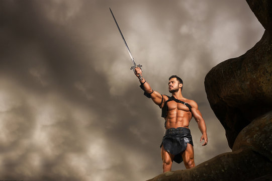 Young warrior on a mountain peak
