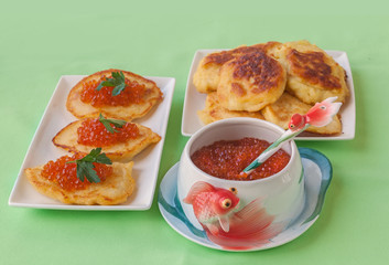 Red caviar and thick potato pancakes at Shrovetide (mass produce