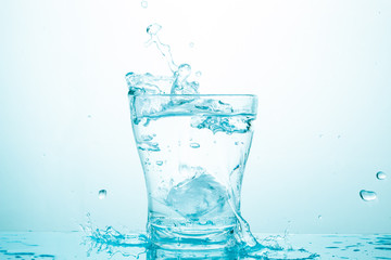 water splash in glasses isolated on white