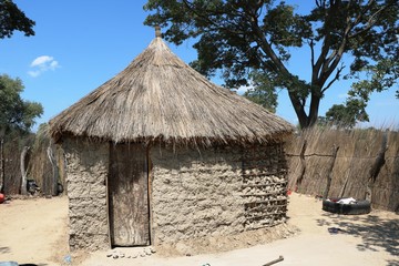 Fototapeta na wymiar Typical huts of the San in Namibia, Africa 
