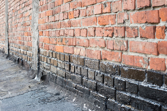 priming brick wall