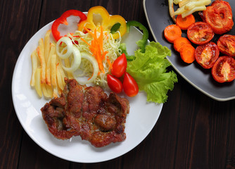 Grilled  pork and  vegetables salad.