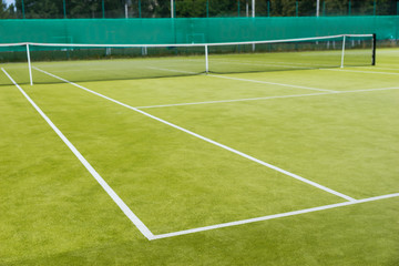Lawn tennis court and net