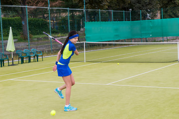 Young attractive woman during the game wearing a sportswear on a