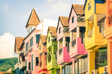 Architectural detail of multicolored vintage houses in Patong town - World famous destination Phuket in Thailand - obrazy, fototapety, plakaty