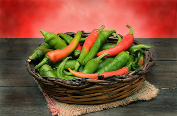 raw sweet peppers in basket